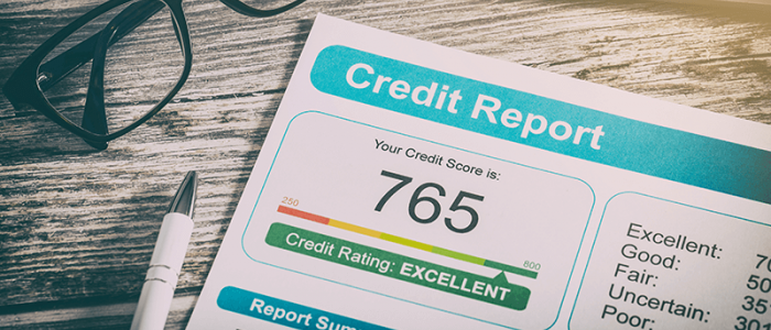 A printed out credit report showing an excellent score of 765